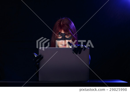 Night photo of female hacker 29825998