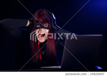 Girl hacker in black mask Girl hacker in black mask 29826007