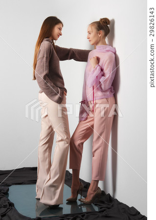 Two pretty girls in angora sweater and pants 29826143