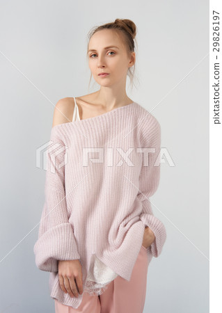 Pretty girl in angora sweater and slim pants 29826197