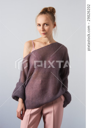 Pretty girl in angora sweater and slim pants Pretty girl in angora sweater and slim pants 29826202
