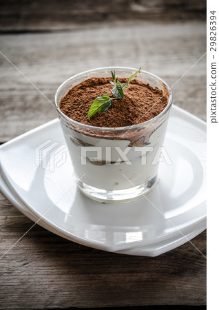 Tiramisu in the glass on the wooden background 29826394