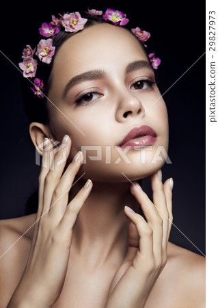 Beautiful girl with pink flowers. Beautiful girl with pink flowers. 29827973