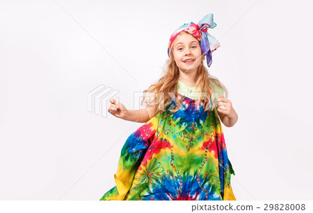 Happy blonde child girl in hippie colorful dress 29828008