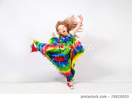 Happy blonde child girl in hippie colorful dress Happy blonde child girl in hippie colorful dress 29828020