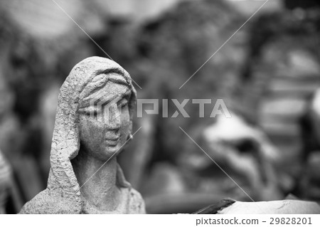 Concrete sculptures of female figures in the 29828201