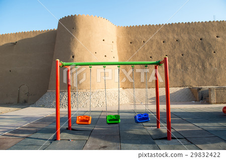 Playground swing in front of the fortress 29832422
