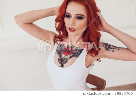 Portrait of a beautiful sexy girl with red hair Portrait of a beautiful sexy girl with red hair 29834700