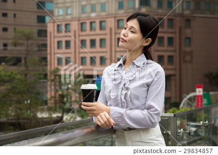Business photography, strong woman, coffee break 29834857