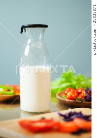 Milk in bottle with vegetables. Milk in bottle with vegetables. 29835871