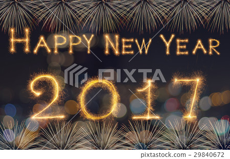 Happy new year 2017 written with Sparkle firework on black background, celebration and greeting cards concept Happy new year 2017 written with Sparkle firework on black background, celebration and greeting cards concept 29840672