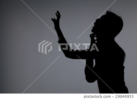A woman in a silhouette suffers A woman in a silhouette suffers 29840955