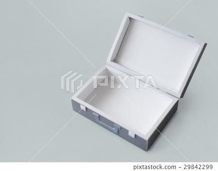 Opened Suitcase in Grey with Green Handle Isolated 29842299