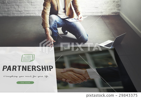Partnership word on business handshake background Partnership word on business handshake background 29843375