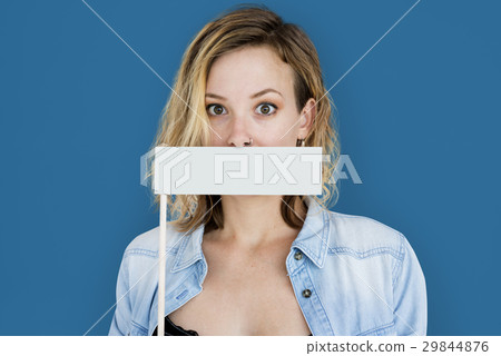 Caucasian Woman Holding Flag Covering Mouth 29844876