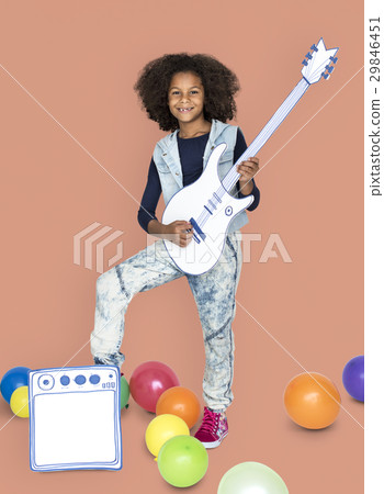 Portrait of a Little African Descent Girl with a Guitar Isolated 29846451