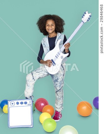 Portrait of a Little African Descent Girl with a Guitar Isolated 29846468