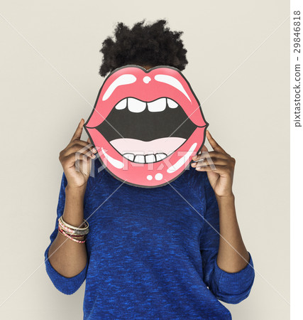 African Woman holding Peper Mouth Over her Face African Woman holding Peper Mouth Over her Face 29846818