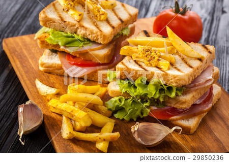 club sandwich with Tomato, lettuce, bacon, ham club sandwich with Tomato, lettuce, bacon, ham 29850236