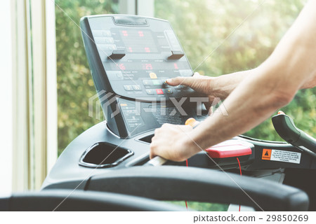 Asian senior man hands using treadmill control. 29850269