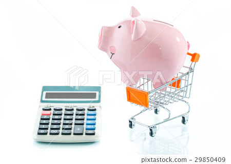 Piggy bank, calculator and a shopping trolley 29850409