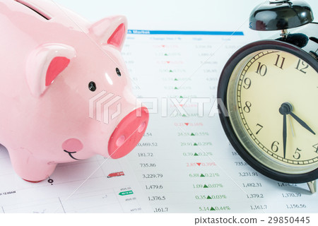 Alarmclock with piggybank, stock market Alarmclock with piggybank, stock market 29850445