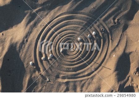 Conceptual sundial on the beach sand Conceptual sundial on the beach sand 29854980