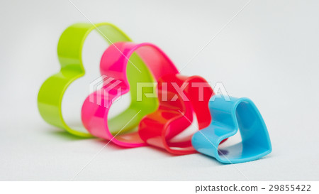 Heart shaped cookie cutter on white background Heart shaped cookie cutter on white background 29855422