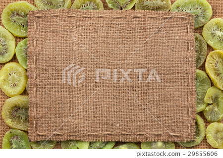 Frame made of burlap with the line lies on kiwi Frame made of burlap with the line lies on kiwi 29855606