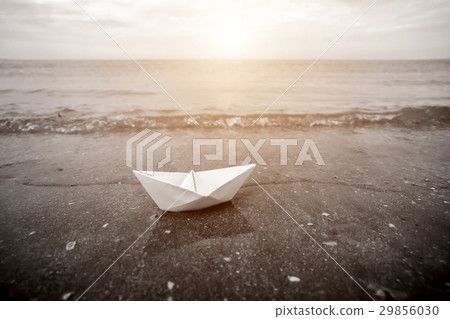 Black and white image of paper boats on beach Black and white image of paper boats on beach 29856030