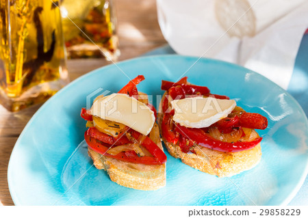Bruschetta with peppers and goat cheese  Bruschetta with peppers and goat cheese  29858229