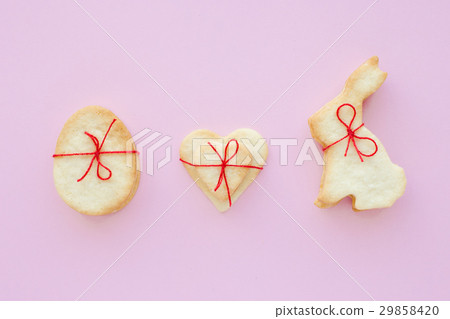 Homemade Easter cookies with red bow  29858420