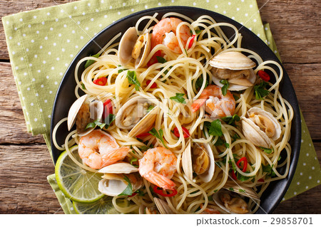Pasta spaghetti with clam, shrimp, chili and lime Pasta spaghetti with clam, shrimp, chili and lime 29858701