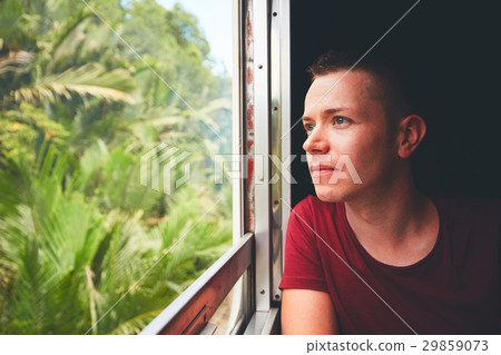 Man traveling by historical train Man traveling by historical train 29859073