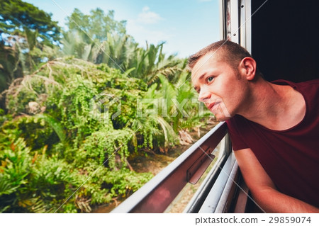 Man traveling by historical train Man traveling by historical train 29859074