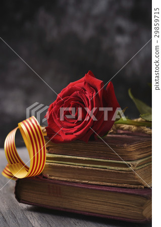 red rose, catalan flag and old books 29859715