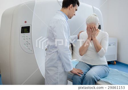 Sad depressed woman covering her face 29861153