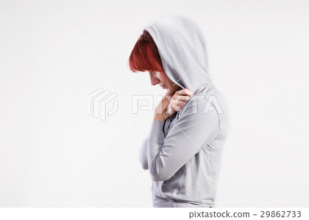 Attractive young fitness woman in gray sweatshirt Attractive young fitness woman in gray sweatshirt 29862733