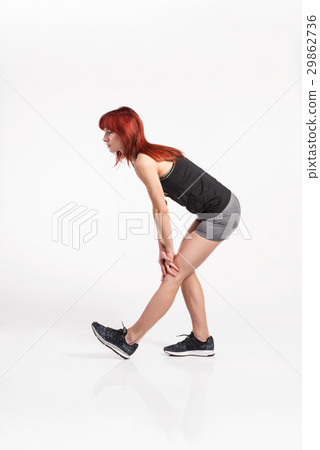 Attractive young fitness woman in black tank top Attractive young fitness woman in black tank top 29862736