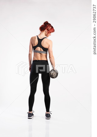 Attractive young fitness woman working out with Attractive young fitness woman working out with 29862737