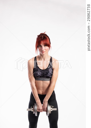 Attractive young fitness woman working out with Attractive young fitness woman working out with 29862738