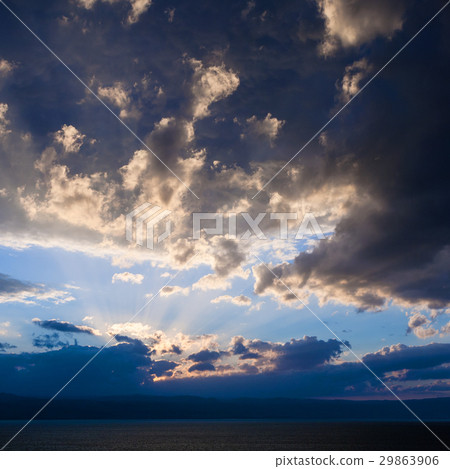 dark blue sunset clouds over Dead Sea in winter dark blue sunset clouds over Dead Sea in winter 29863906