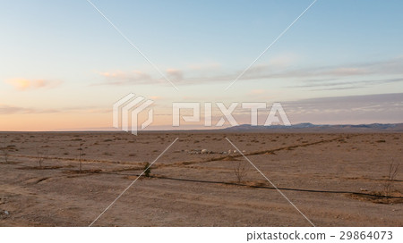 plain land along Desert Highway in Jordan 29864073