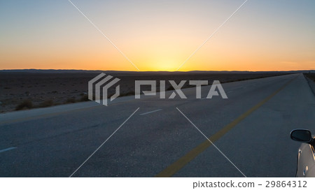 sunset over Desert Highway (Road 15) in Jordan sunset over Desert Highway (Road 15) in Jordan 29864312