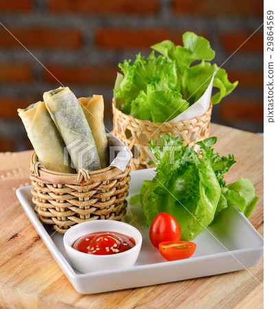 Spinach Rolls on wooden background 29864569