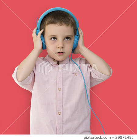 Caucasian Little Boy Trying Headphones 29871485