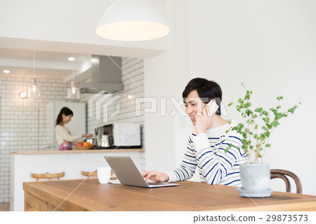 Young man teleworking Young man teleworking 29873573