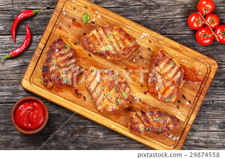 图库照片: delicious juicy pork chops, top view