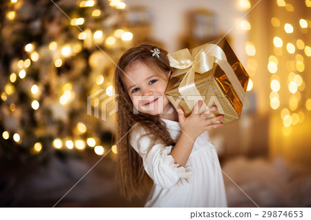 Caucasian girl with blond long hair Christmas gift 29874653