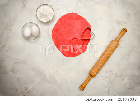 Red dough with a cut out heart, rolling pin Red dough with a cut out heart, rolling pin 29875038